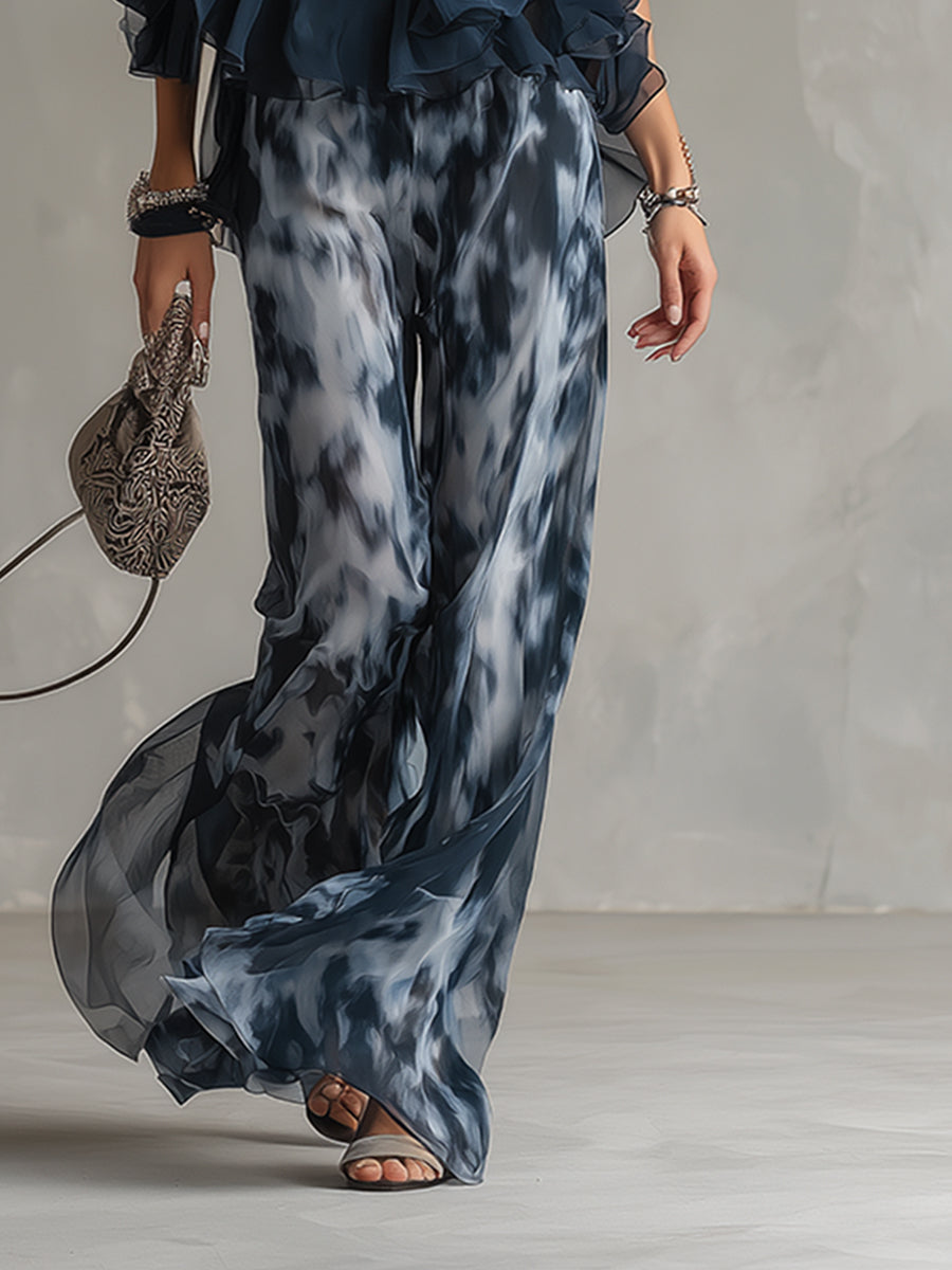 Chloé | Ensemble élégant avec haut dos nu bleu marine et pantalon large imprimé